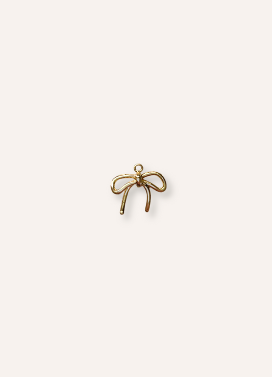 gold bow charm
